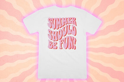 White tee shirt with the copy: Summer Should Be Fun, in front of a color orange and pink design