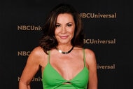 Luann De Lesseps smiles and poses at an NBC event