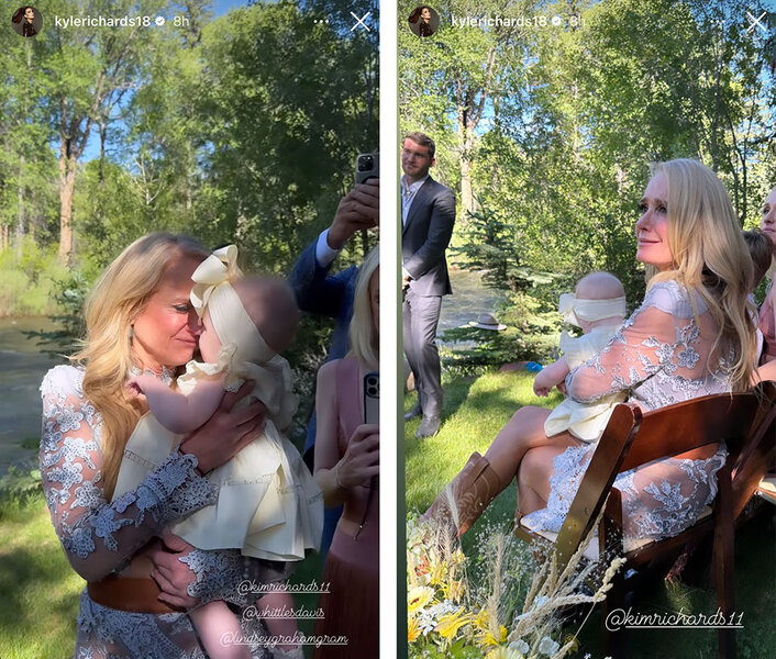 Kim Richards holding a baby at Whitney's wedding.