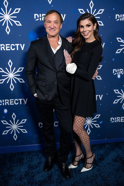 Dr. Terry Dubrow and Heather Dubrow attend the DIRECTV Celebrates Christmas At Kathy's
