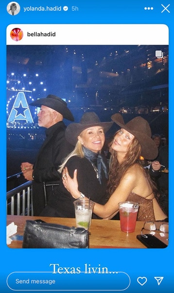 Yolanda and Bella Hadid posing together while wearing cowboy hats.