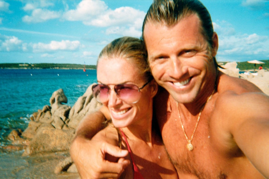 Eileen Davidson and her husband, Vincent Van Patten, smiling on the beach.