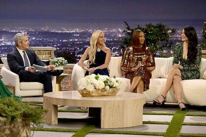 Andy Cohen, Sutton Stracke, Garcelle Beauvais, Crystal Kung Minkoff talk in front of a Beverly Hills themed set during the Season 13 Reunion.