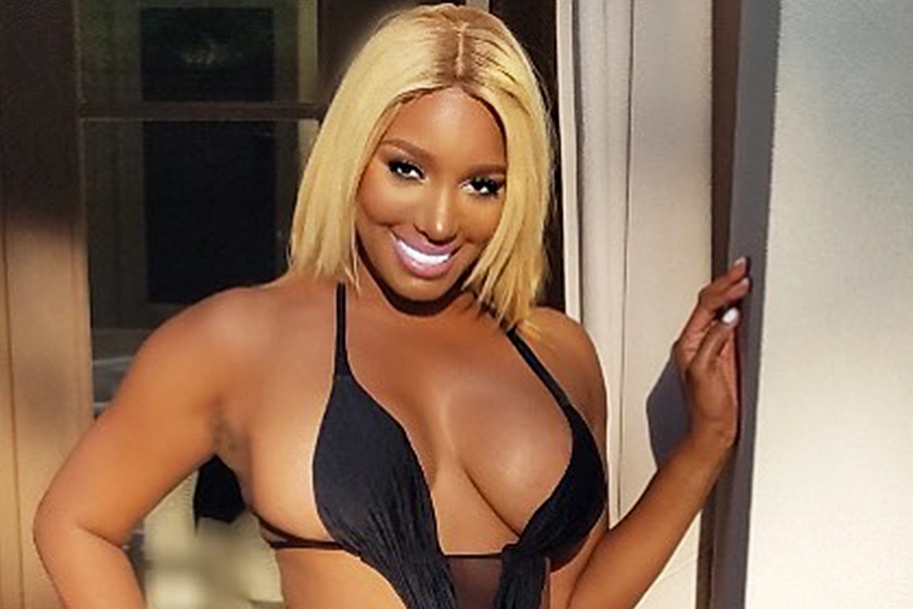 NeNe Leakes Shows Off Incredibly Sexy Body In Swimsuit Pics.