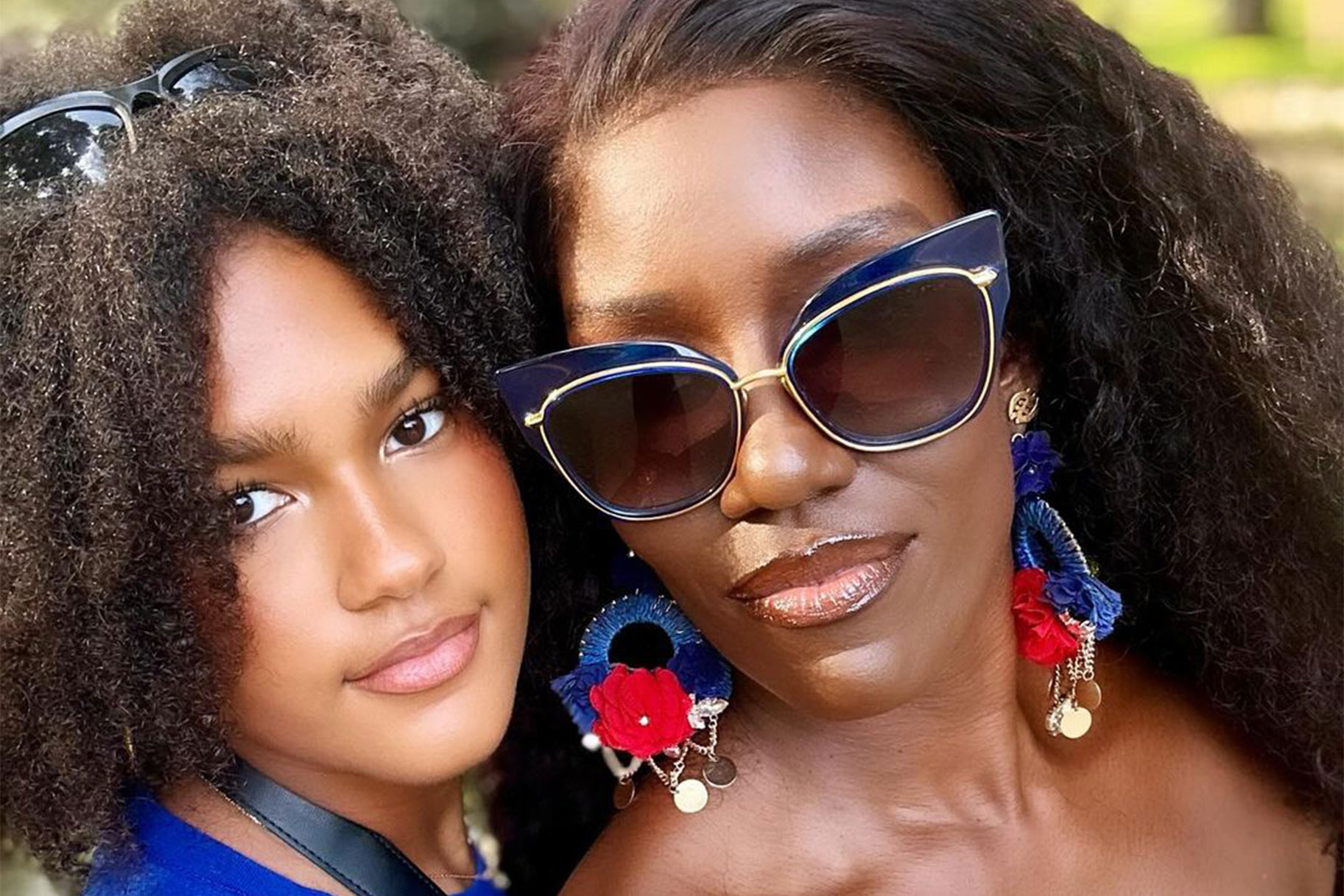 Bozoma Saint John and Lael Saint John posing together in Rio De Janeiro, Brazil.