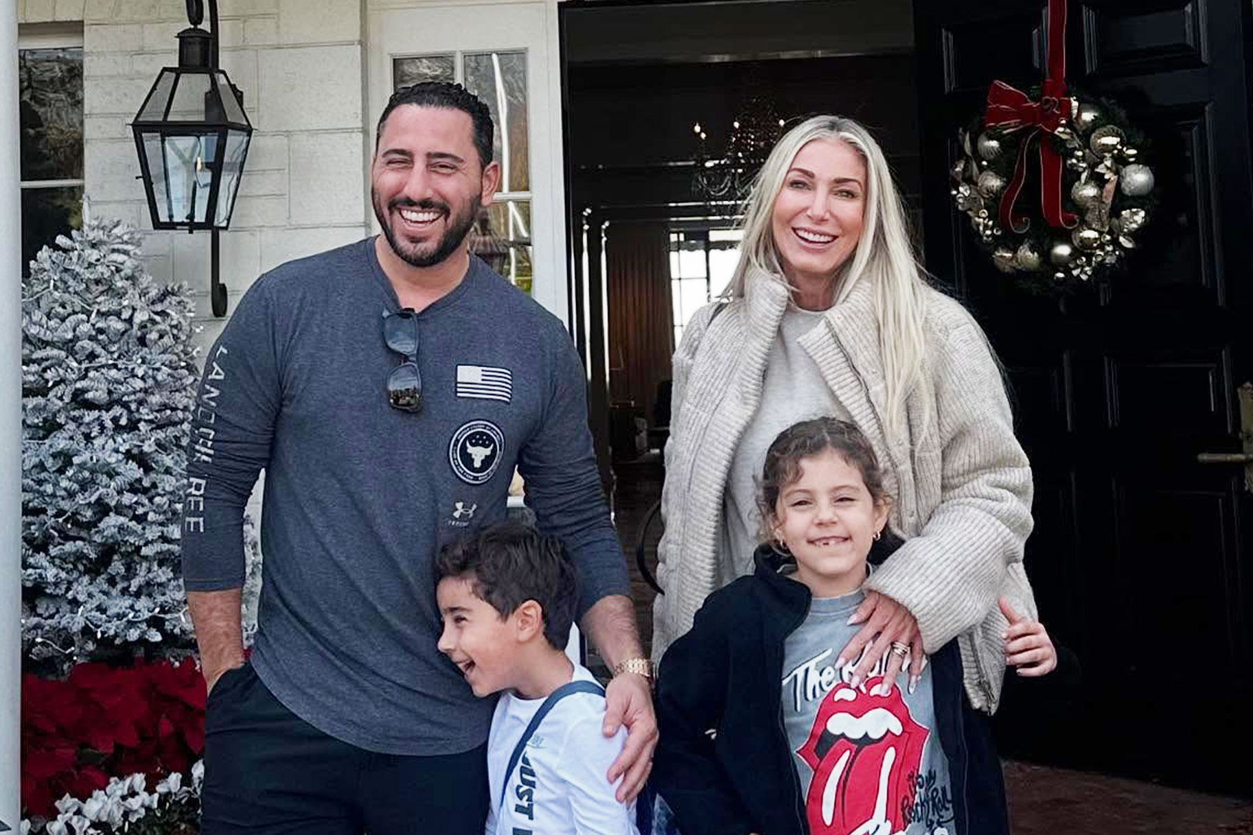 Josh Altman, Heather Altman, Ace Altman, and Lexi Altman smiling together outdoors.