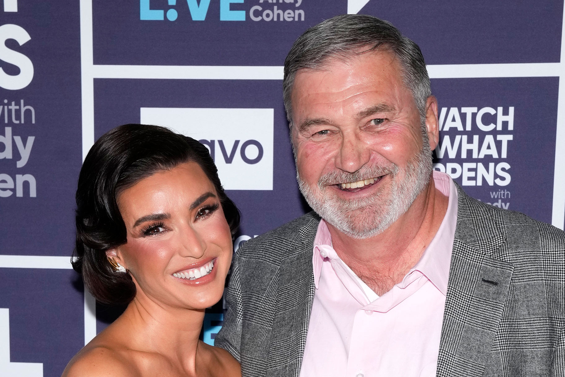 Bronwyn Newport and husband Todd Bradley smiling together in New York City.