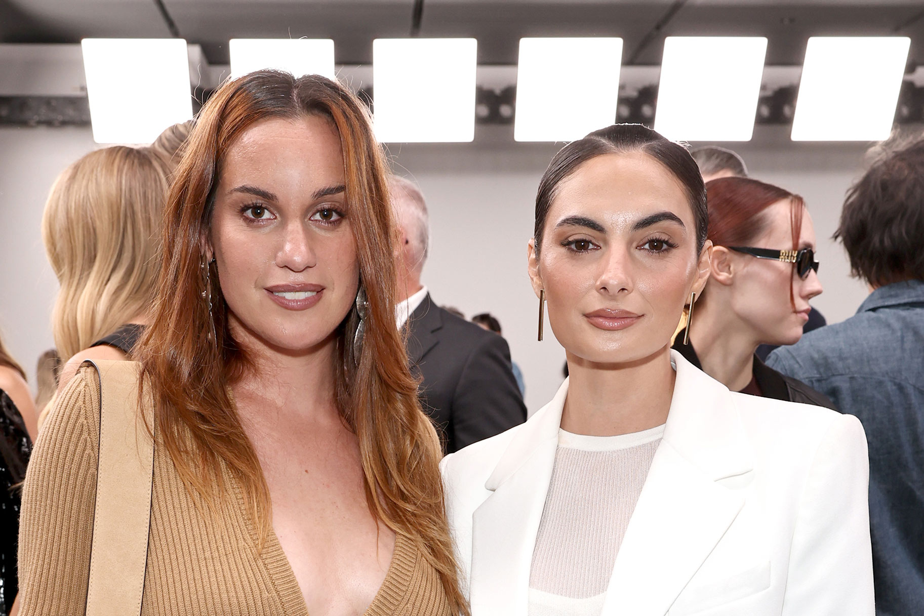 Paige DeSorbo and Hannah Berner posing together at New York Fashion Week.