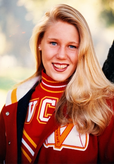 A high school portrait of Gretchen Rossi in her letterman's jacket.