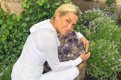 Yolanda Hugs Flowers