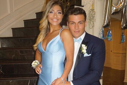 Gia Giudice and Frank Catania pose for a photo together.