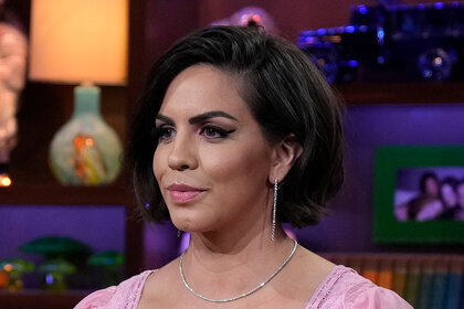 Katie Maloney wearing a pink dress on Watch What Happens Live