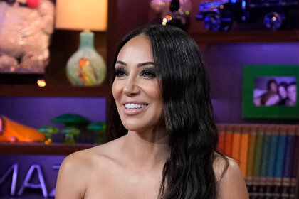 Melissa Gorga smiles as a guest on Watch What Happens Live