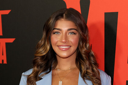 Gia Giudice at a red carpet event.