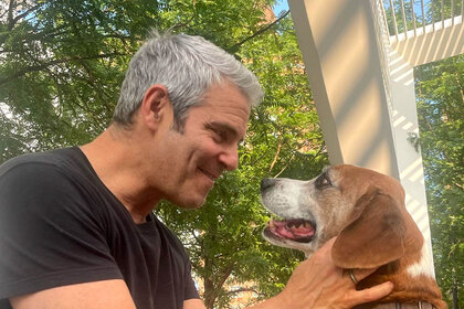 Andy Cohen and his former dog Wacha during a reunion