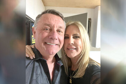 Vicki Gunvalson and her boyfriend Michael Smith pose for a photo together.