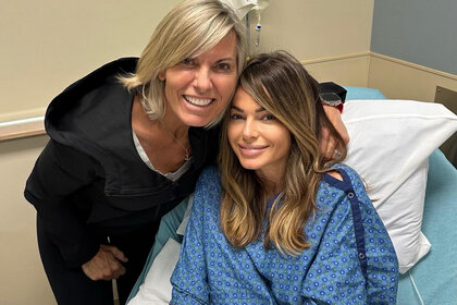 Captain Sandy Yawn and her girlfriend Leah Shafer pose for a photo.