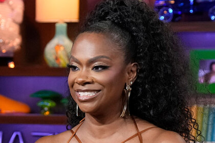 Kandi smiling at the Watch What Happens Live clubhouse.