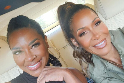 Kenya and Sheree smiling together in a car.