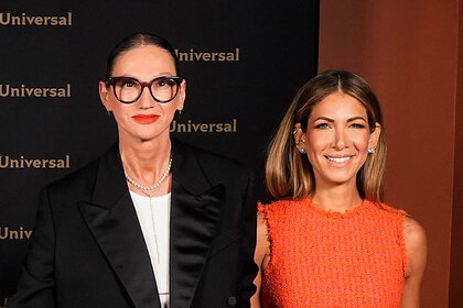 Jenna Lyons and Erin Lichy together at the NBC Upfronts in New York in front of a step and repeat.