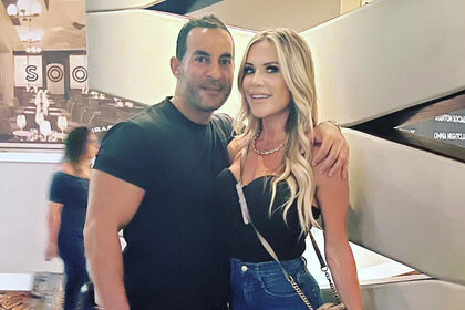 Jennifer Pedranti and Ryan Boyajian posing together at NOBU in Las Vegas.