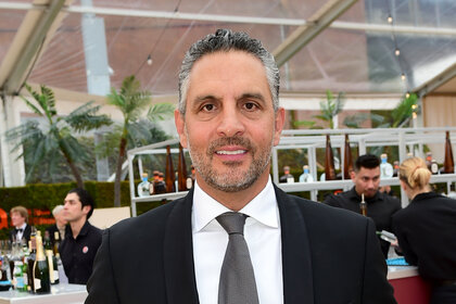 Mauricio Umansky wearing a black suit at the Elton John AIDS Foundation viewing party.