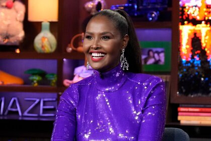 Ubah Hassan Wearing a purple dress while being a guest on WWHL.