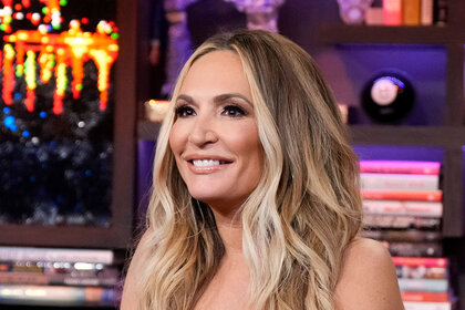 Kate Chastain smiling at the Watch What Happens Live clubhouse in New York City.