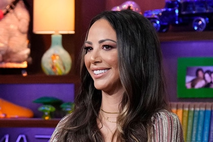 Kristen Doute smiling at the Watch What Happens Live clubhouse in New York City.