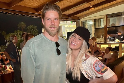 Jeremy Madix and Ariana Madix smiling while out together.