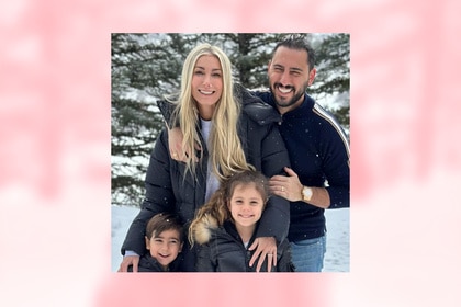 Heather Altman and Josh Altman smiling with their kids.