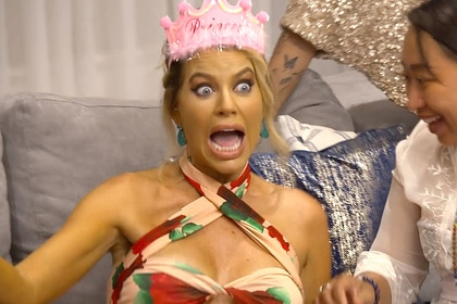 Caroline Stanbury is surprised by what a psychic tells her at a party.