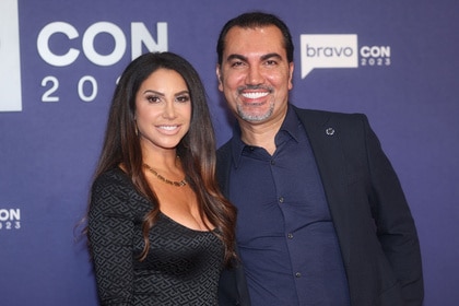 Jennifer Aydin and Bill Aydin walk the red carpet of BravoCon 2023.