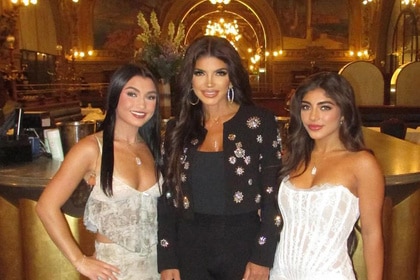 Teresa Giudice, Milania Giudice, and Gabriella Giudice smiling and posing together.