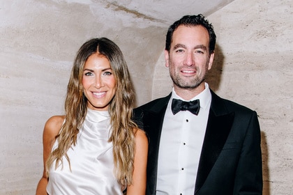 Erin Lichy wearing a white gown and Abe Lichy wearing a tuxedo at the ABT Fall Gala