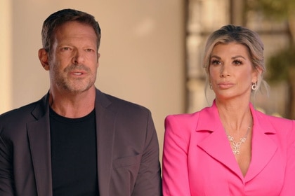 John Janssen wearing a grey jacket and Alexis Bellino wearing a pink blazer during an interview together