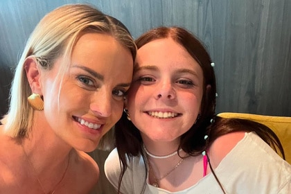 Whitney Rose and her daughter Bobbie Rose smiling together