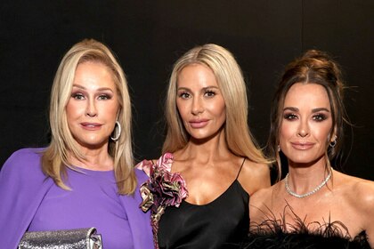 Kathy Hilton, Dorit Kemsley, and Kyle Richards posing together at an event.