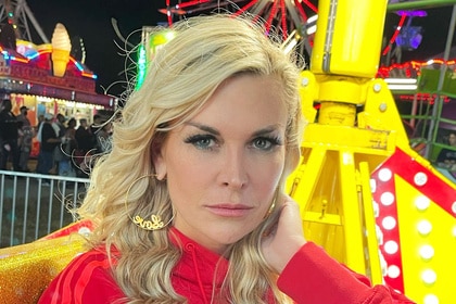 Tinsley Mortimer posing on a fair ride.