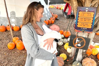 Lala Kent holds her newborn daughter Sosa Kent at a pumpkin patch