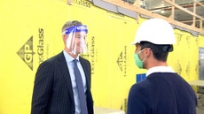 Ryan Serhant Wears a "Face Condom" While Visiting a New Development