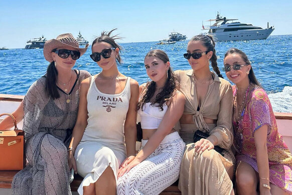 Kyle Richards and her four daughters on a boat while in Italy on vacation.