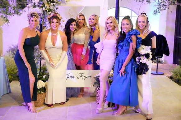 The cast of RHOC dressed in gowns during the finale party