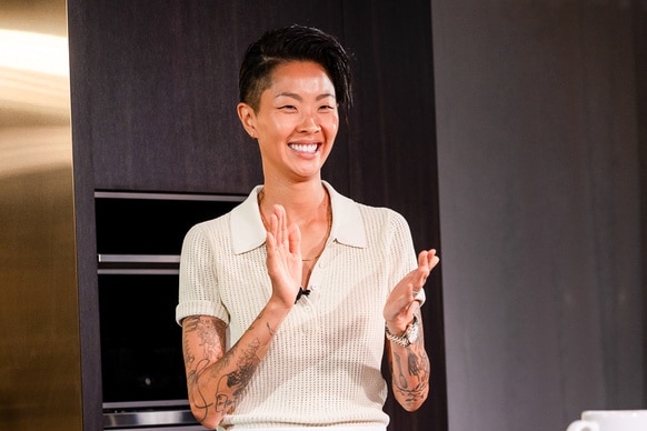 Kristen Kish clapping during the Food and wine festival