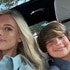 Madison Lecroy and Hudson Hughes smiling together in a car.