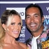 Jennifer Pedranti and Ryan Boyajian posing in front of a step and repeat.