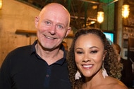 Ashley Darby and Michael Darby smiling together at an event.