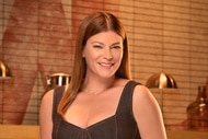 Gail Simmons wearing a denim dress in a kitchen pantry