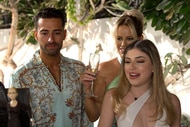 Caroline Stanbury her husband, Sergio Carrallo, and her daughter Yasmin at their going away party.