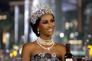 Chanel Ayan wearing a tiara and a strapless gown